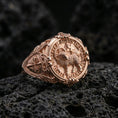 Load image into Gallery viewer, Rose gold plated Agnus Dei seal ring on volcanic stone, Lamb of God emblem signet face, vintage cross side engraving
