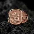 Load image into Gallery viewer, Rose gold plated Saint Anthony signet ring on volcanic stone, Saint Anthony relief with cross accents, devotional signet ring
