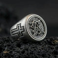 Load image into Gallery viewer, Oxidized 925 sterling silver Christian monogram signet ring on volcanic rock, cross-engraved band and intertwined letter emblem
