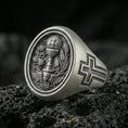 Load image into Gallery viewer, Oxidized 925 sterling silver Holy Eucharist signet ring on volcanic rock, chalice and host engraving with grape and wheat details
