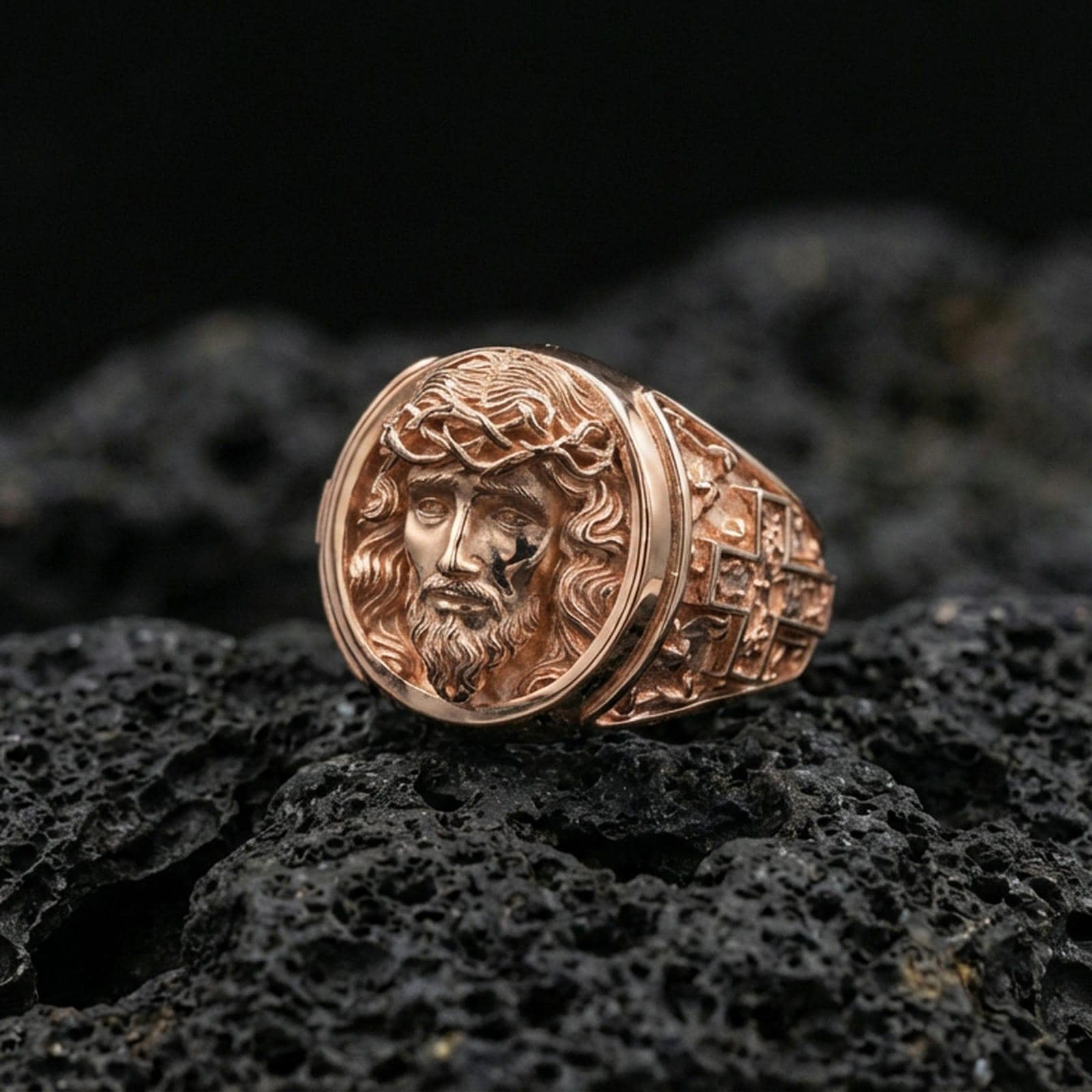 Rose gold plated Jesus Christ ring on volcanic stone, crown of thorns portrait relief with premium statement ring profile