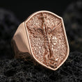 Load image into Gallery viewer, Rose gold plated Saint Michael signet ring on volcanic stone, shield-shaped face with angel battle scene and raised border
