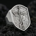 Load image into Gallery viewer, Polished silver Saint Michael signet ring on porous volcanic stone, “Quis ut Deus” shield detail and hammer-texture face
