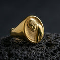 Load image into Gallery viewer, Gold plated Pope portrait signet ring on dark volcanic rock, Catholic religious medallion face with smooth bezel
