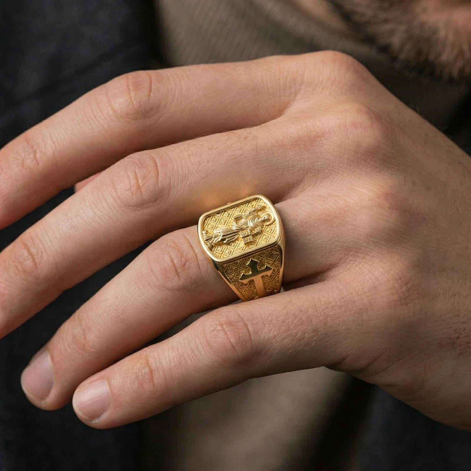 Gold plated Saint Dominic signet ring worn on finger, Catholic saint relief face with cross side panel