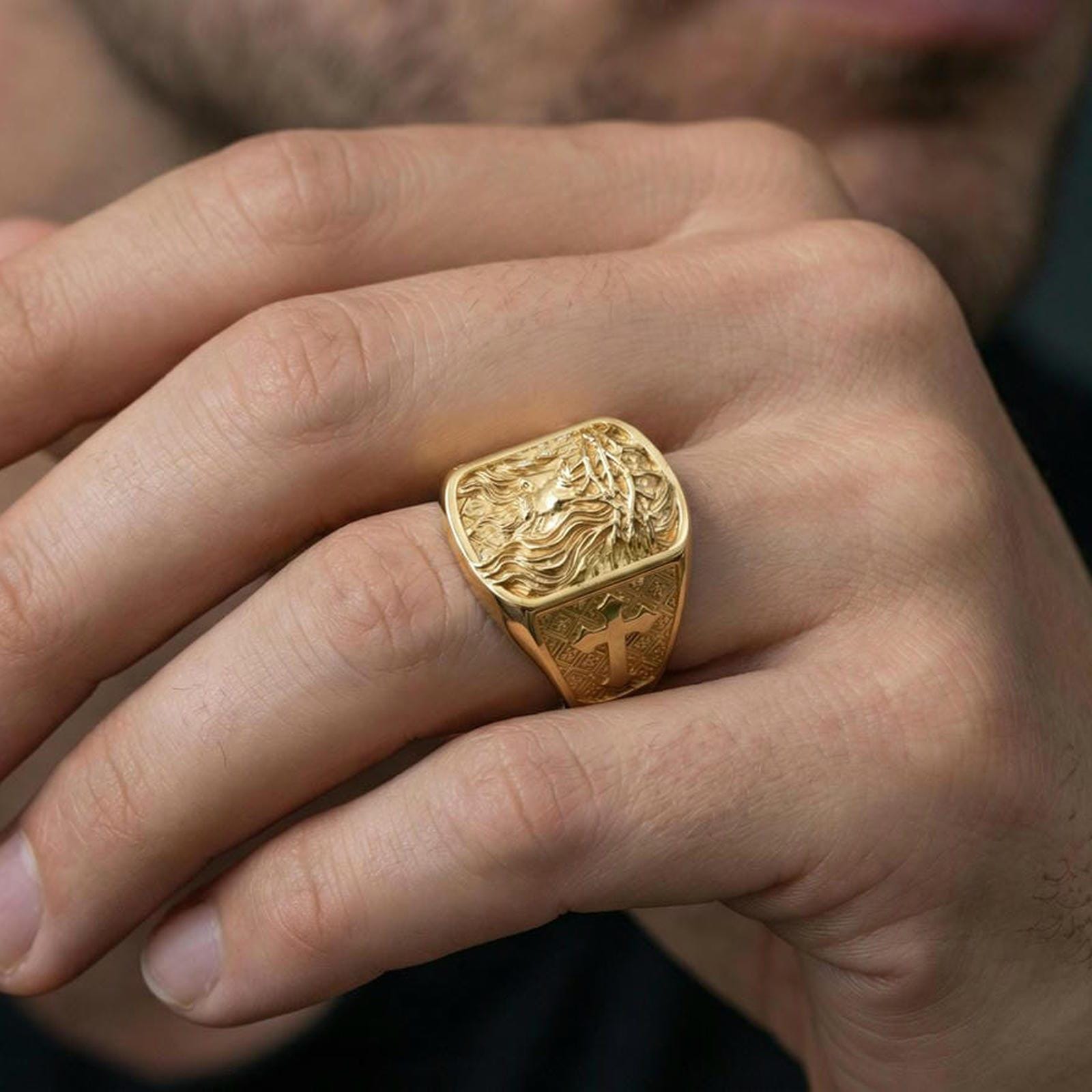 Gold plated Jesus ring worn on finger, Crown of Thorns engraving with cross motif side detail