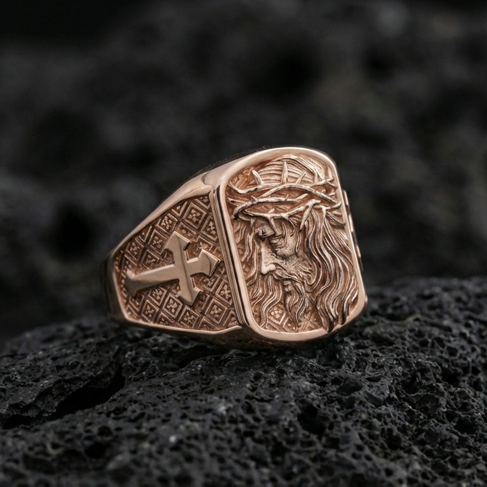 Rose gold plated Jesus of Nazareth ring on volcanic stone, Christ portrait relief with cross pattern band