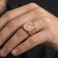 Load image into Gallery viewer, Rose gold plated Saint Andrew signet ring worn on finger, apostle relief with cross motif side detail
