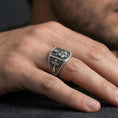 Load image into Gallery viewer, Oxidized 925 sterling silver Saint Anthony ring worn on finger, saint holding Child Jesus relief with cross side panel
