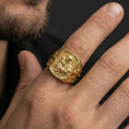 Load image into Gallery viewer, Gold plated Saint Anthony ring worn on finger, saint holding Child Jesus relief with cross band side detail

