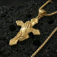 Load image into Gallery viewer, Gold plated praying hands cross pendant necklace on volcanic rock, premium macro shot emphasizing the rosary chain relief, engraved cross shapes, and bright shine
