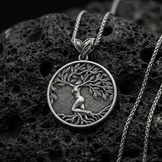 Oxidized 925 sterling silver Yggdrasil tree of life pendant on volcanic rock, Norse mythology circular medallion with braided chain
