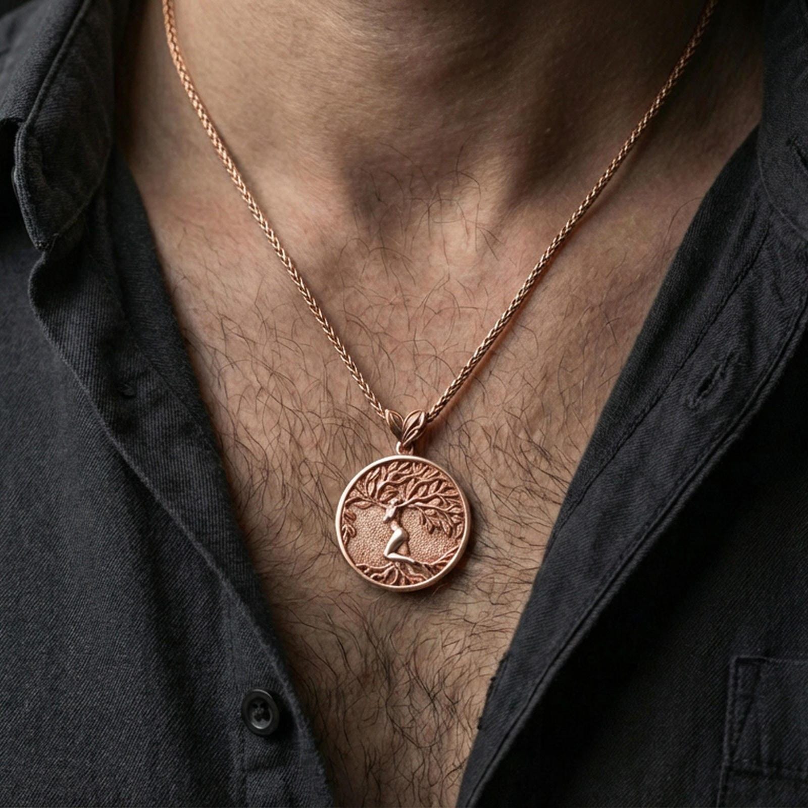 Rose gold plated Yggdrasil pendant necklace worn on neck, detailed tree of life design in circular frame