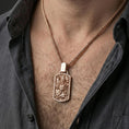 Load image into Gallery viewer, Rose gold plated foo dog dog tag pendant worn on neck, Chinese guardian lion talisman necklace on braided chain
