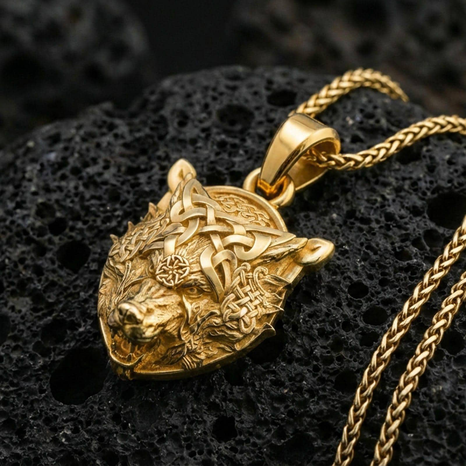 Gold plated Fenrir wolf pendant on volcanic rock, Norse mythology Viking necklace with Celtic knot pattern and detailed wolf head