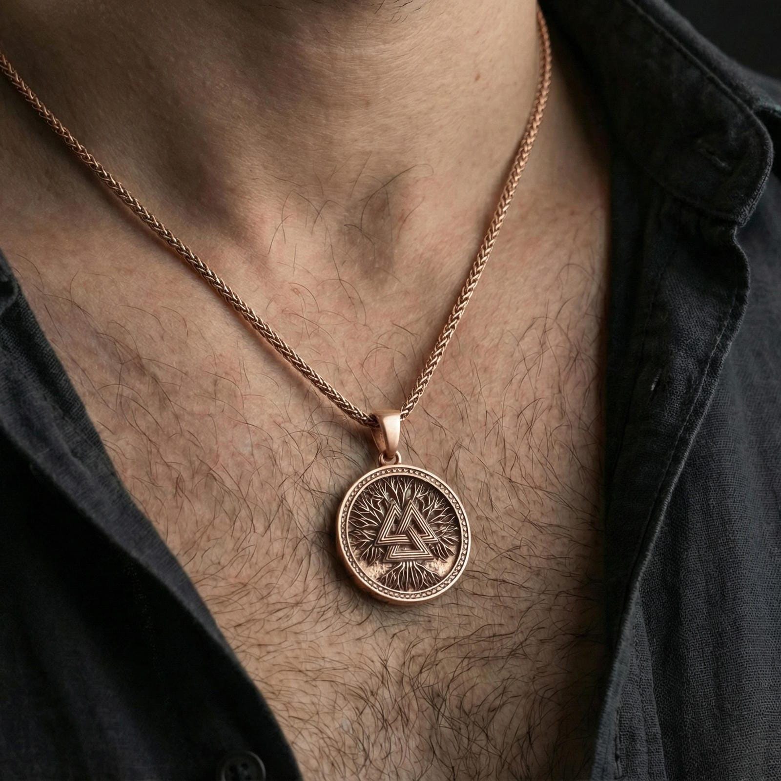 Rose gold plated valknut necklace worn on neck, Norse valknut amulet pendant with modern warrior aesthetic
