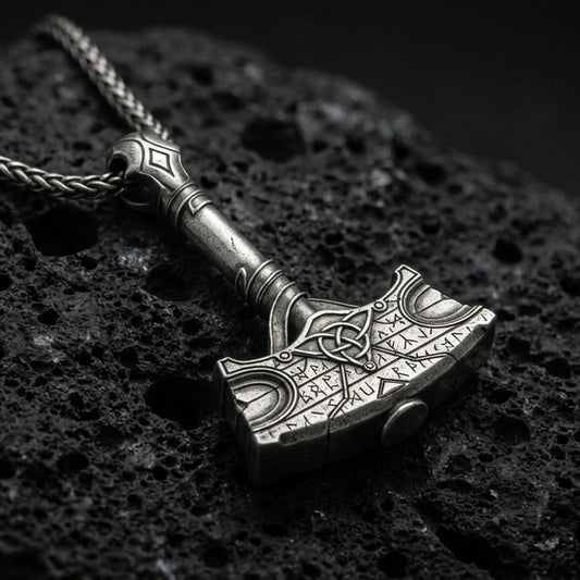 Oxidized 925 sterling silver Mjolnir pendant on volcanic rock, Thor hammer Viking necklace with rune engraving and braided chain