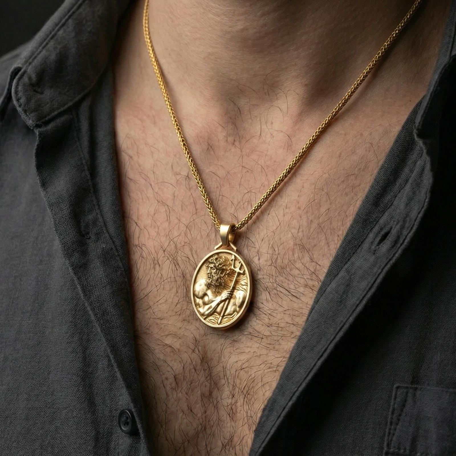 Gold plated Poseidon pendant worn on neck, Greek god trident necklace as a bold mythology statement piece