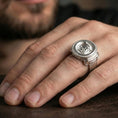 Load image into Gallery viewer, Polished silver Greek coin ring on the finger, wearable photo highlighting the helmeted warrior portrait and textured backdrop
