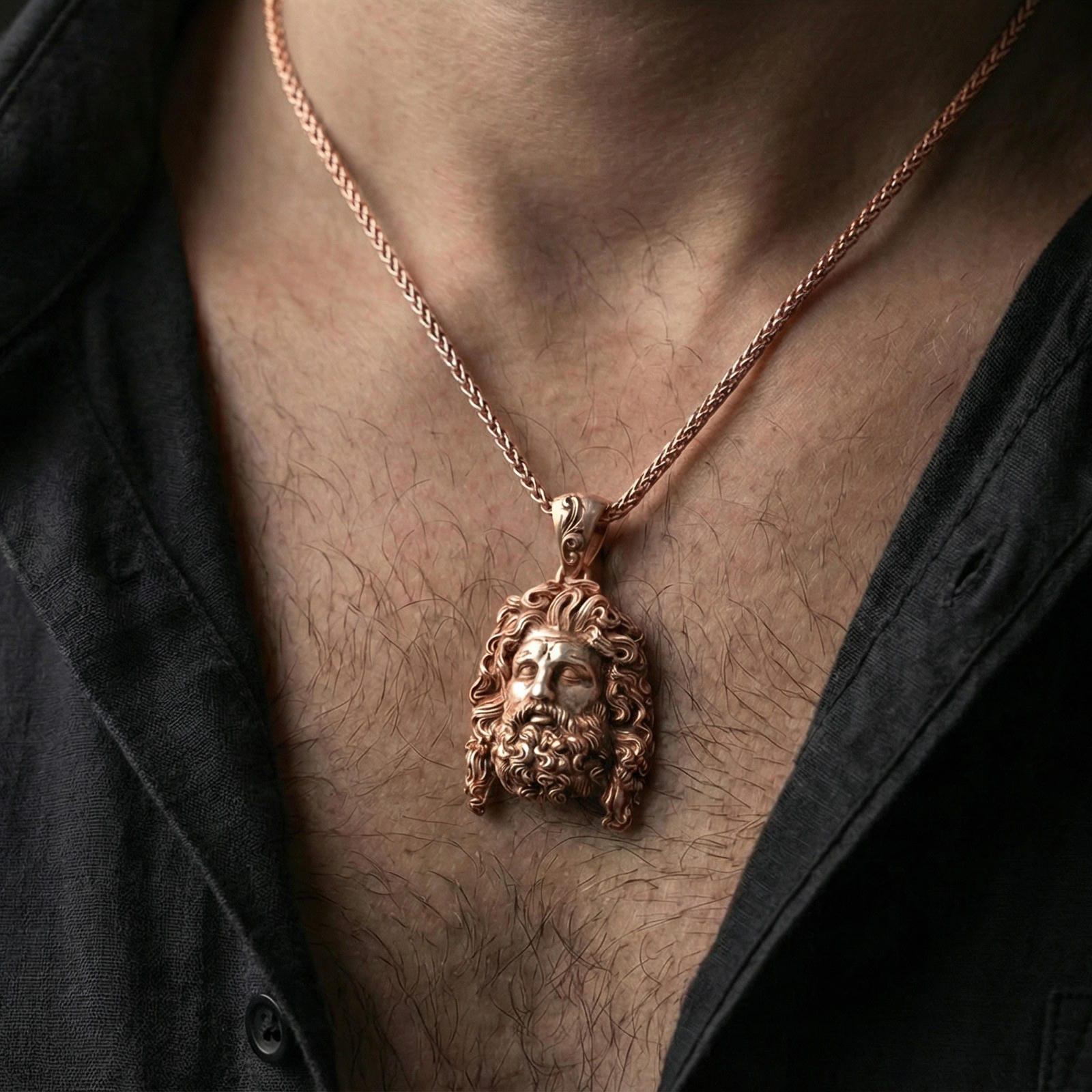 Rose gold plated deity head pendant necklace worn on neck, lifestyle close-up, warm tone plating and sculpt detail