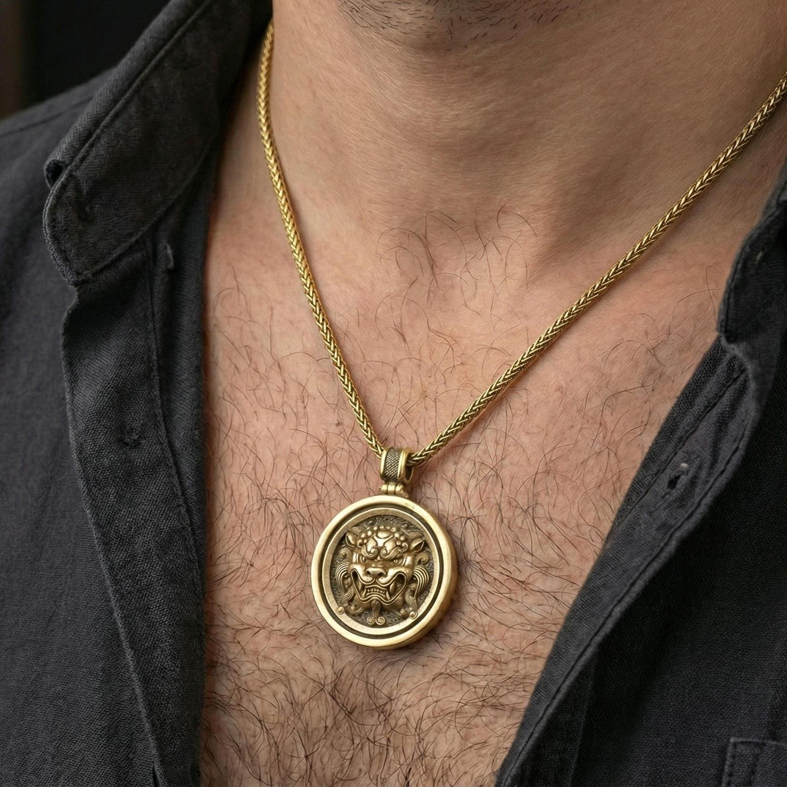 Gold plated guardian lion medallion necklace worn on neck, premium styling, rotating medallion disk as focal point