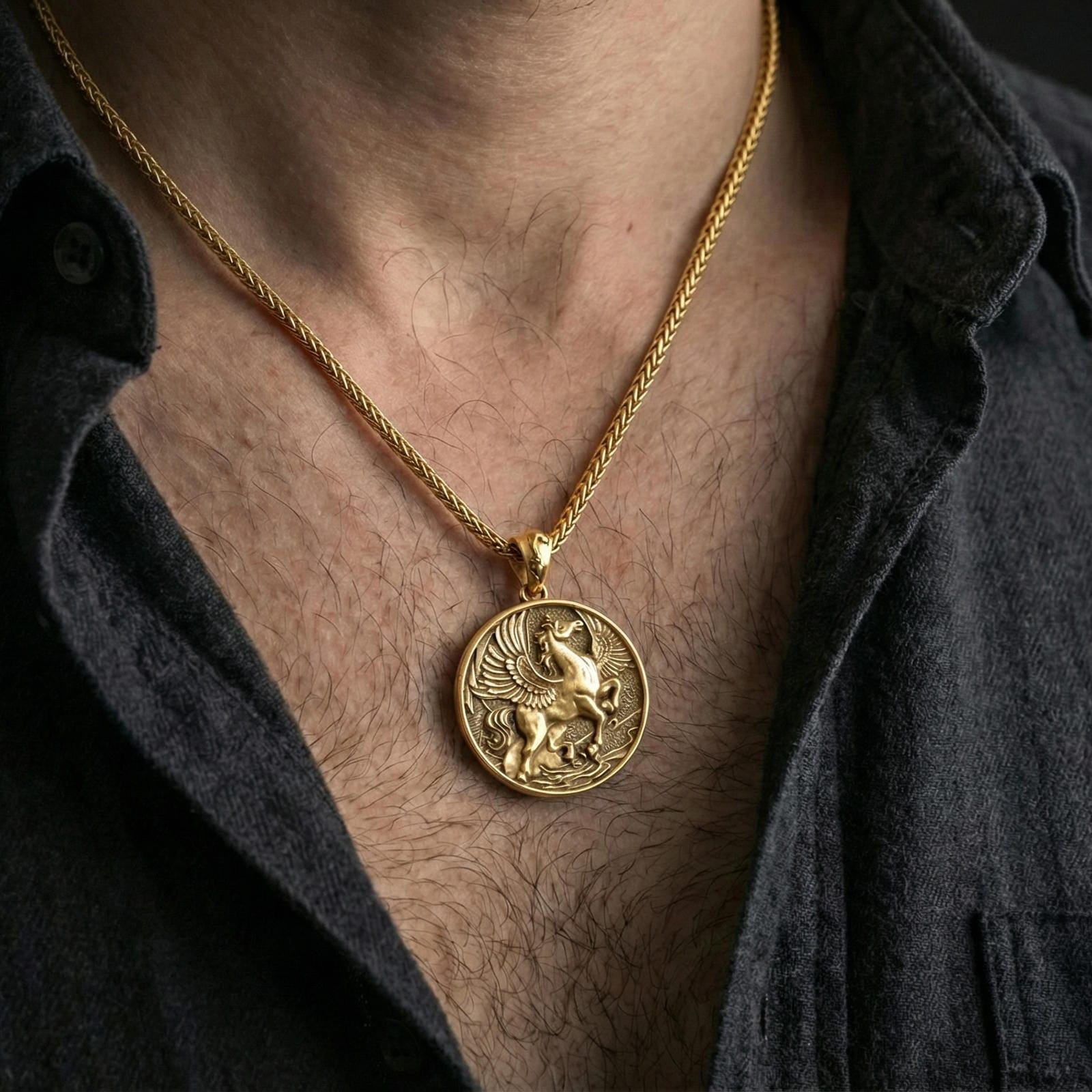 Gold plated winged Pegasus medallion necklace worn on neck, premium styling, myth-inspired pendant as focal point