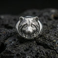 Load image into Gallery viewer, Polished silver raccoon signet ring on volcanic rock, crisp facial features and smooth round bezel edge, close-up lighting
