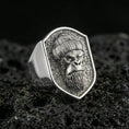 Load image into Gallery viewer, Polished silver gorilla warrior signet ring on volcanic rock, crisp beard and helmet relief, clean shield bezel close-up
