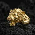 Load image into Gallery viewer, Gold plated angry lion king ring on volcanic rock, premium studio lighting, bold roaring lion head with deep sculpted texture
