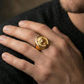 Load image into Gallery viewer, Gold plated tiger oval signet ring worn on finger, premium lifestyle photo, statement tiger totem ring with detailed facial carving
