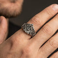 Load image into Gallery viewer, Oxidized Masonic signet ring worn on a finger, close-up lifestyle photo highlighting the square and compass “G” emblem
