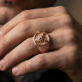 Load image into Gallery viewer, Rose gold plated seigaiha wave oni mask ring worn on a finger, macro lifestyle image showing the ornate frame and horned demon face detail
