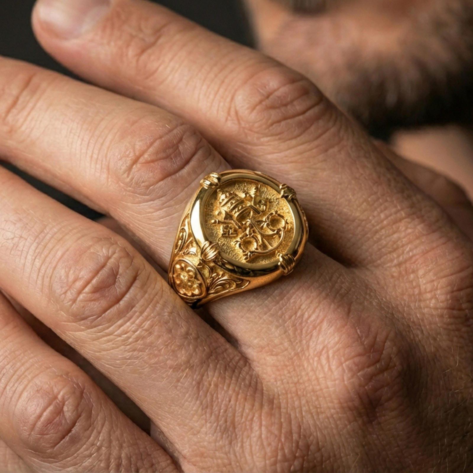 Gold plated Saint Peter signet ring worn on a finger, close-up lifestyle image emphasizing the Keys of Heaven and papal tiara design