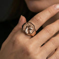 Load image into Gallery viewer, Rose gold plated horse signet ring on finger, close-up lifestyle photo emphasizing the bold octagonal face and mane engraving
