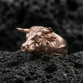 Load image into Gallery viewer, Rose gold plated bull ring on volcanic rock, sharp macro product photo showcasing the sculpted head, horns, and nose ring detail
