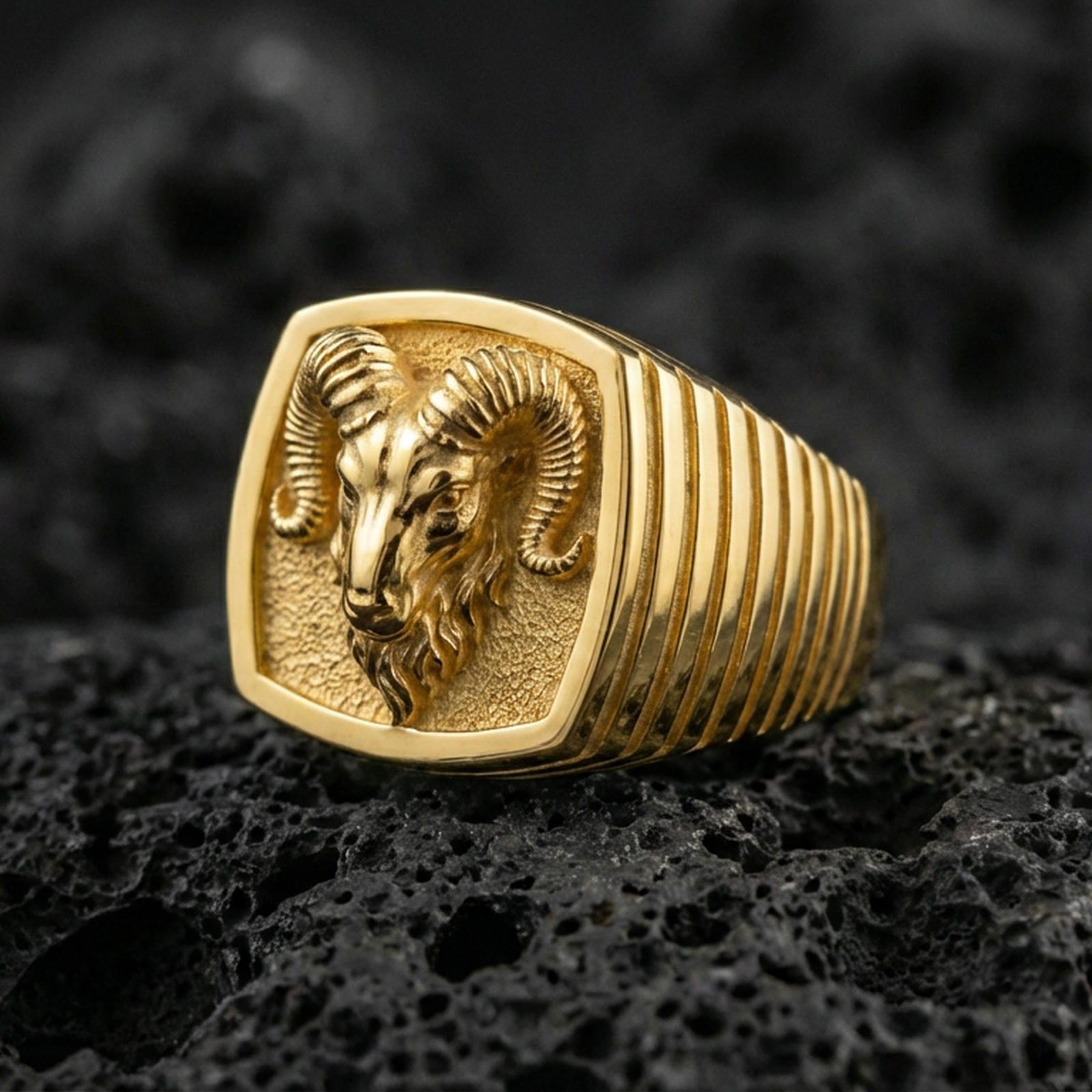 Gold plated ram head signet ring on volcanic stone, bold masculine statement jewelry