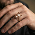 Load image into Gallery viewer, Rose gold plated lynx head ring on finger, close-up lifestyle photo showcasing the feline profile, detailed fur pattern, and statement look
