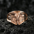 Load image into Gallery viewer, Rose gold plated elephant head ring on volcanic rock, sharp macro product photo showcasing the frontal elephant portrait and clean signet silhouette
