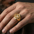 Load image into Gallery viewer, Gold plated wolf signet ring worn on finger, bold alpha wolf aesthetic for confident styling
