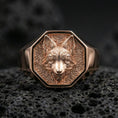 Load image into Gallery viewer, Rose gold plated fox head signet ring on rugged volcanic rock surface, high-end studio macro composition
