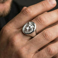 Load image into Gallery viewer, Polished silver leopard ring on finger, natural hand pose highlighting the feline facial relief and clean round bezel profile
