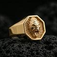 Load image into Gallery viewer, Gold plated octagon gorilla ring on black volcanic stone, close-up highlighting the roaring mouth and relief detail
