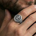 Load image into Gallery viewer, Oxidized royal lion signet ring worn on finger, lifestyle close-up emphasizing the heraldic lion crest and vintage depth
