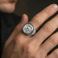 Load image into Gallery viewer, Polished silver yin yang koi ring on a hand, close-up emphasizing the crisp engraving and round face
