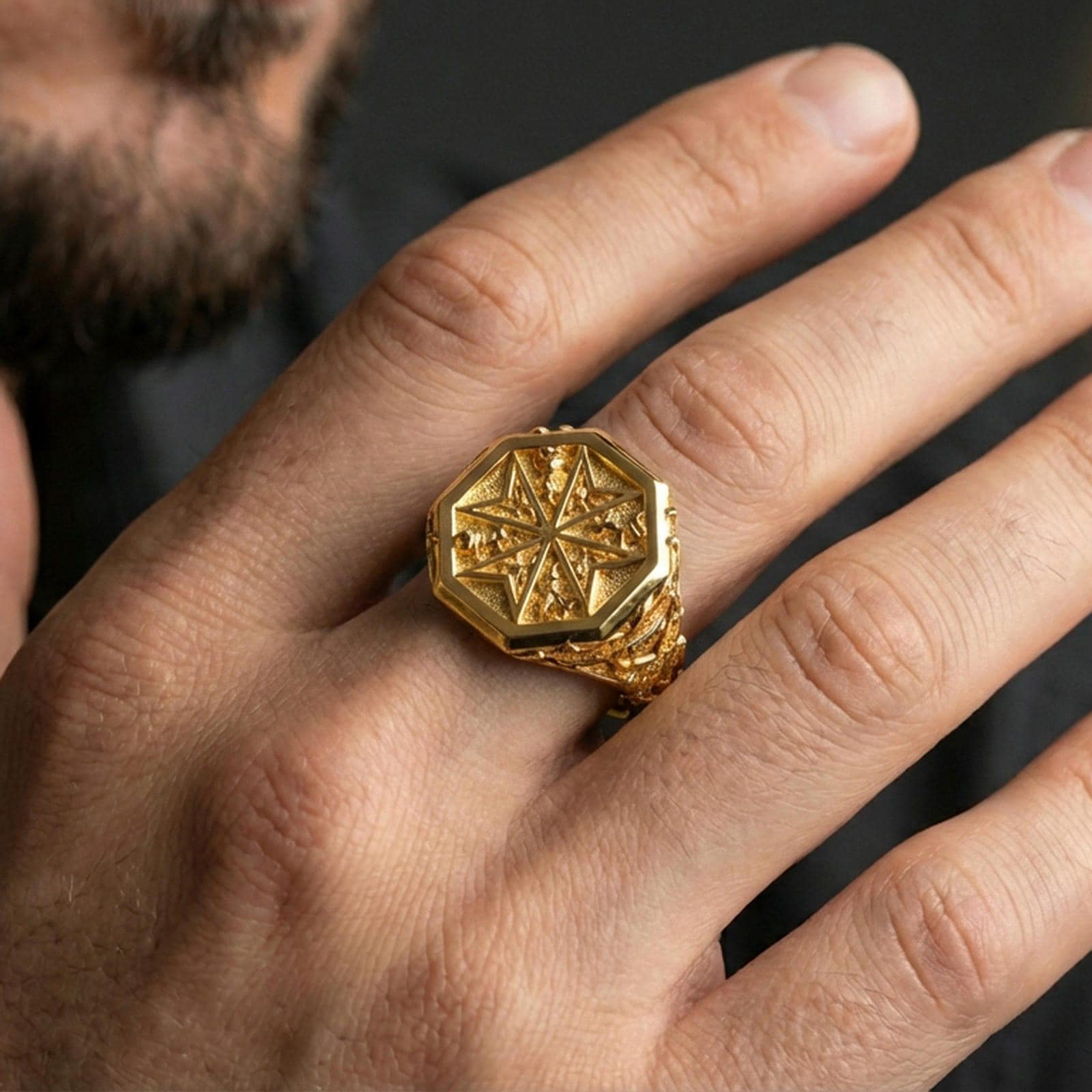 Sterling silver Crusader signet ring worn on a finger, close-up lifestyle photo showcasing the gold plated finish and bold Maltese cross design