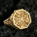 Load image into Gallery viewer, Sterling silver Crusader-inspired signet ring with a gold plated finish, octagonal Maltese cross face with decorative side engravings, macro product shot on volcanic rock
