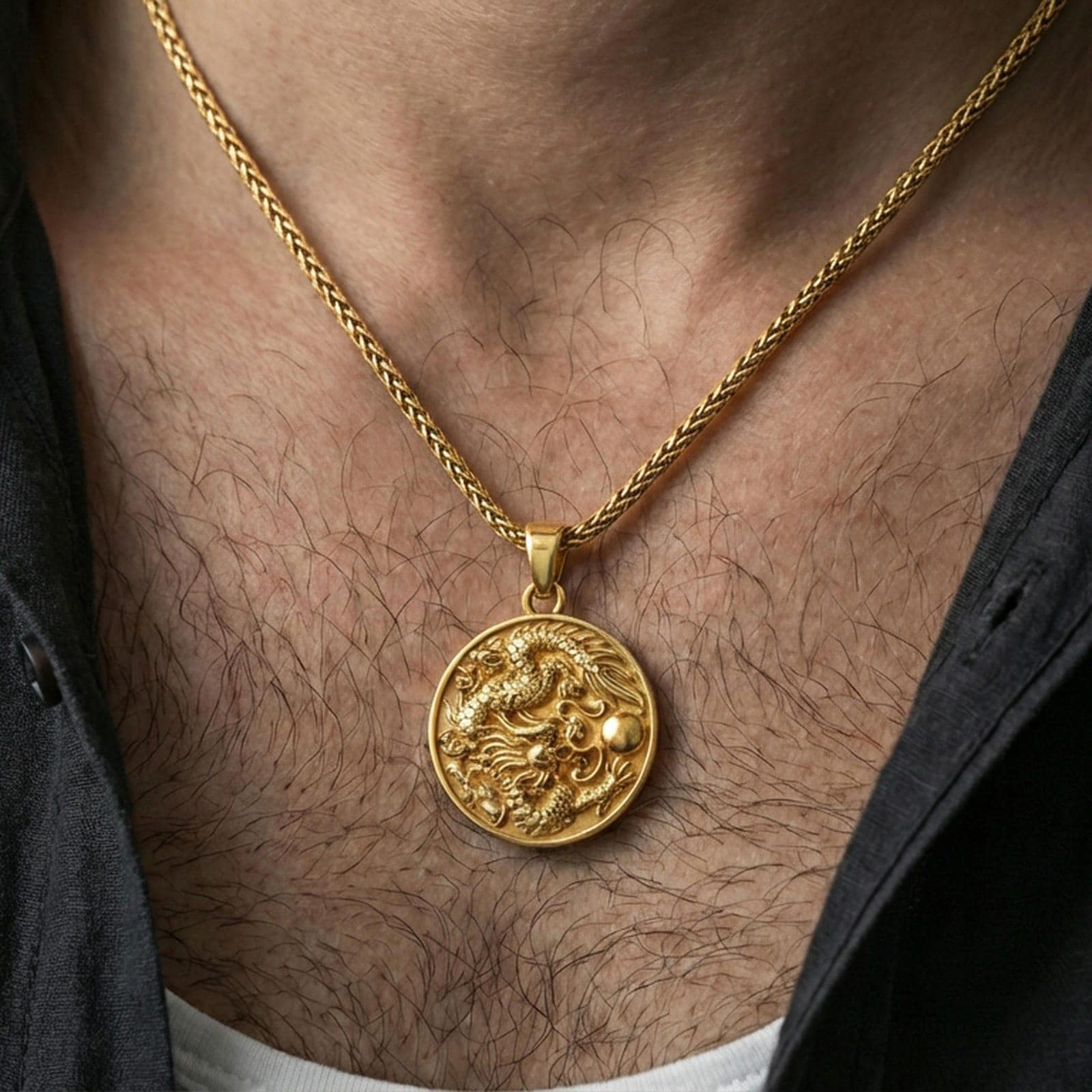 Sterling silver dragon coin pendant worn on the neck, close-up lifestyle photo featuring the gold plated finish and high-relief dragon motif