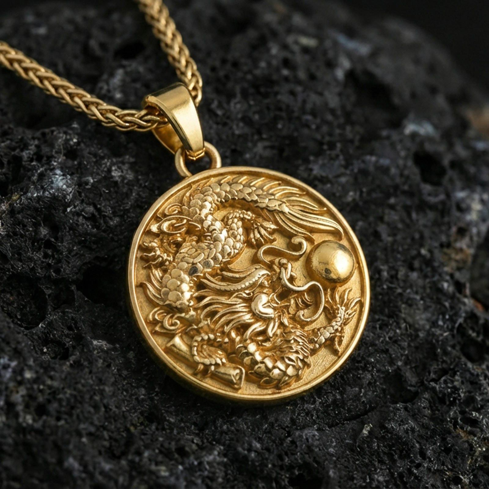 Sterling silver dragon coin pendant with a gold plated finish, intricate dragon motif medallion with swirling cloud details, close-up on volcanic rock