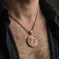 Load image into Gallery viewer, Rose gold plated dragon medallion pendant necklace worn on the neck, lifestyle wear shot with elegant rosy shine and crisp dragon motif texture visible.
