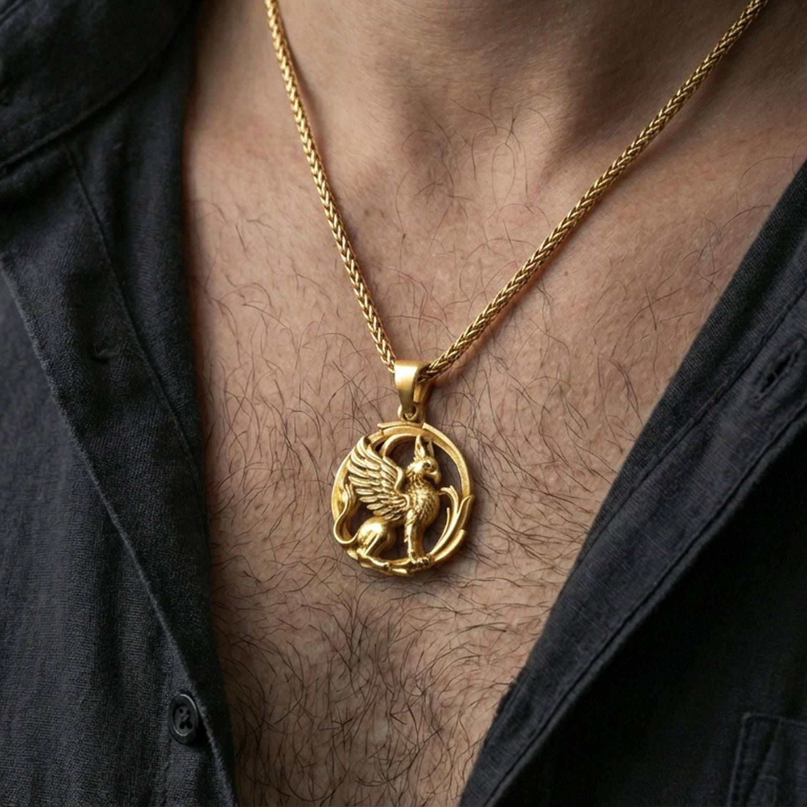 Gold plated griffin pendant necklace worn on the neck, lifestyle photo featuring warm tone finish and strong statement pendant presence.